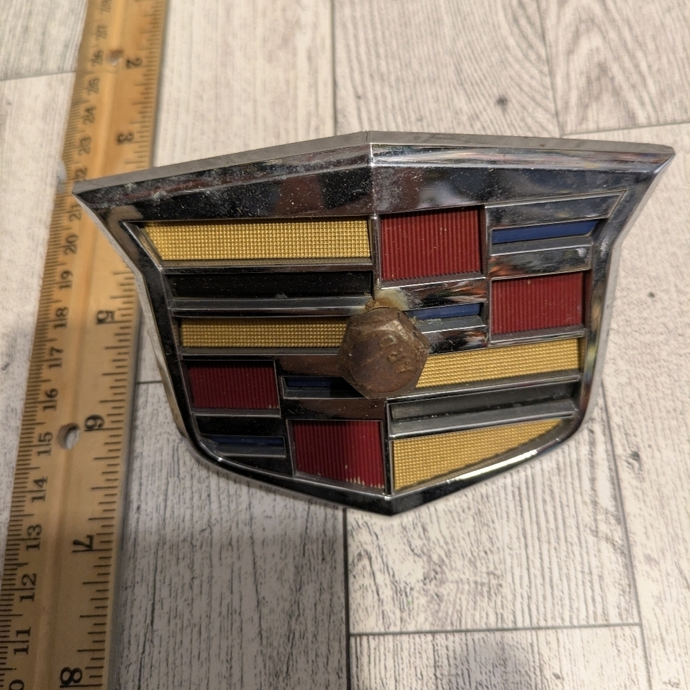 cadillac Emblem with Red, Yellow, and Black Accents